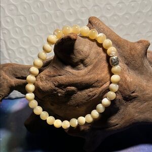 6mm tan mother of pearl